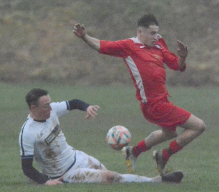 Big tackle by Anthony Couzens
